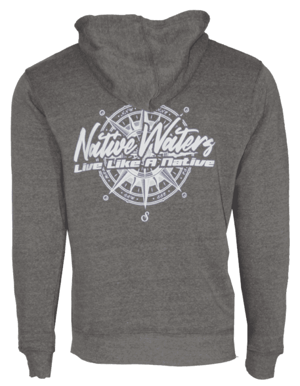 A gray hoodie with a white compass on it.