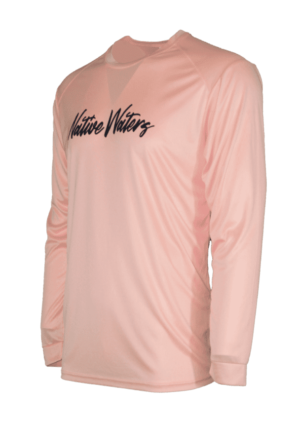 A pink long - sleeved shirt with the words'native wings'on it.