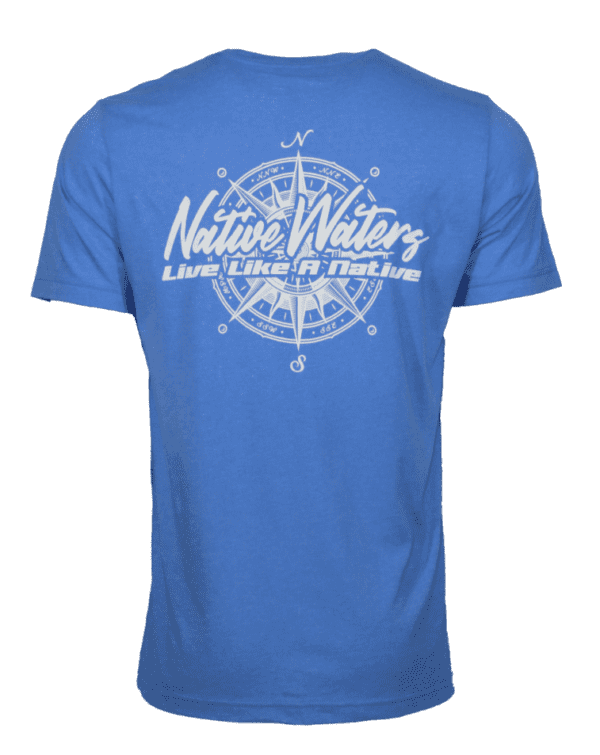 A blue t - shirt with a white compass on it.